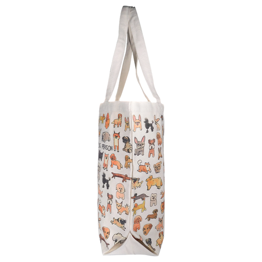 A medium-sized tote bag with a white background featuring a pattern of various animals, predominantly dogs, with multicolored details.