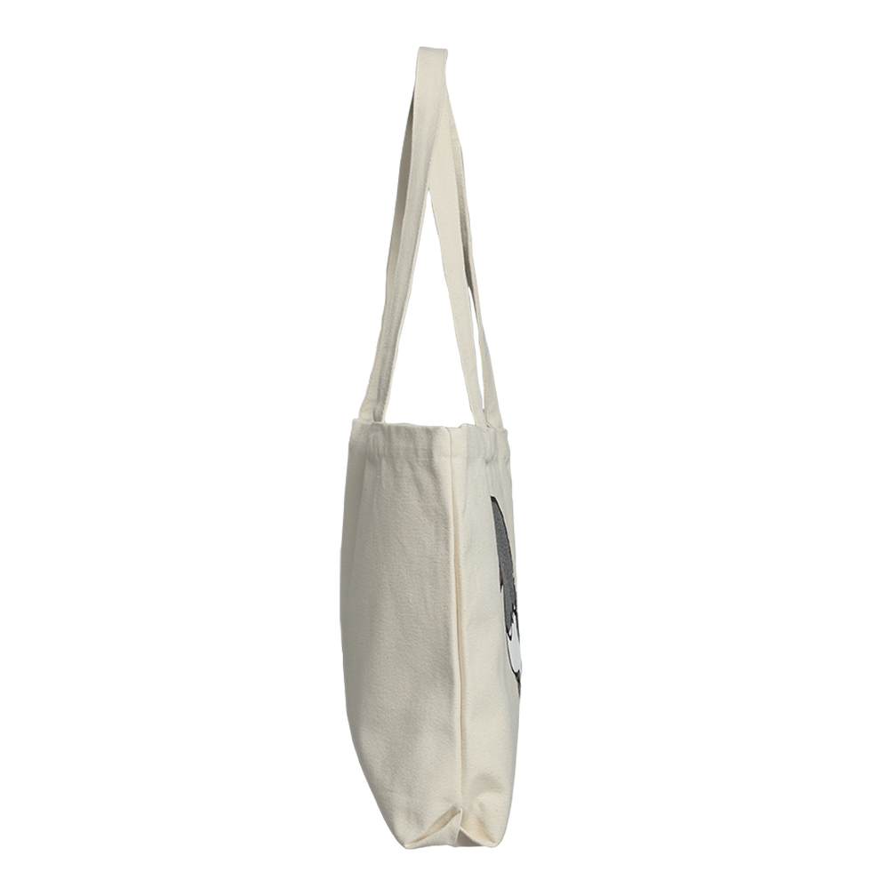Beige tote bag with a small logo on a white background