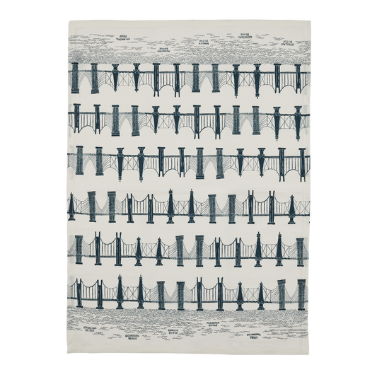 Patterned rug with black bridge design on a beige background