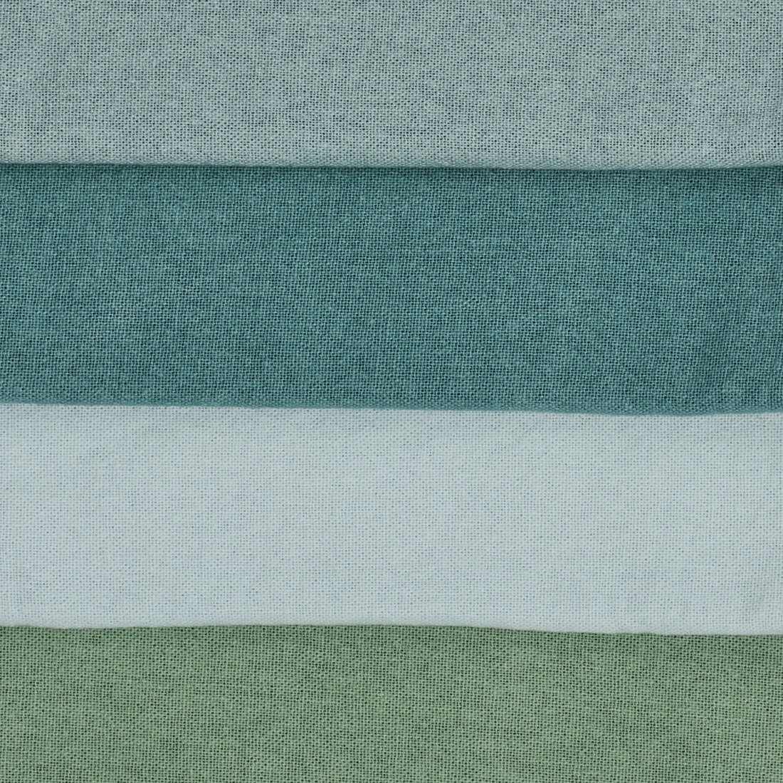 Close-up of fabric with horizontal stripes in green, white, and blue.