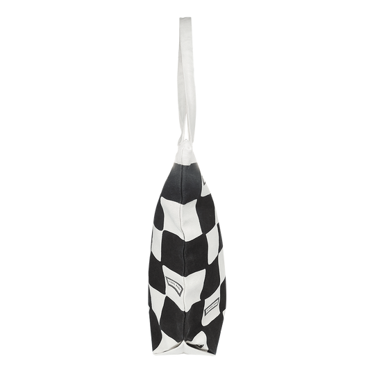A large tote bag with a black and white checkerboard pattern.