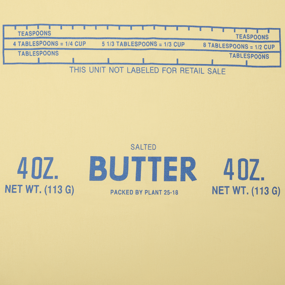 Butter packaging with measurement chart on a beige background