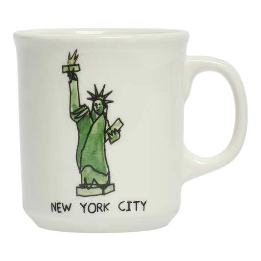 White mug with a green Statue of Liberty illustration and 'New York City' text on a white background