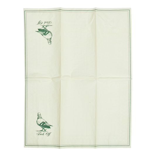 Folded fabric with printed designs of birds and text on a white background