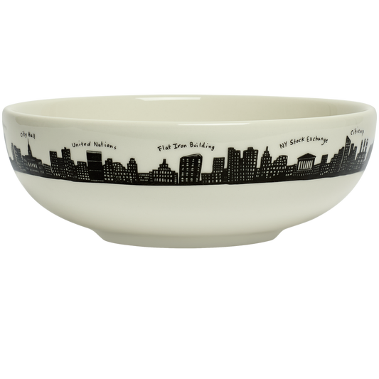 White bowl with black city skyline design on a white background
