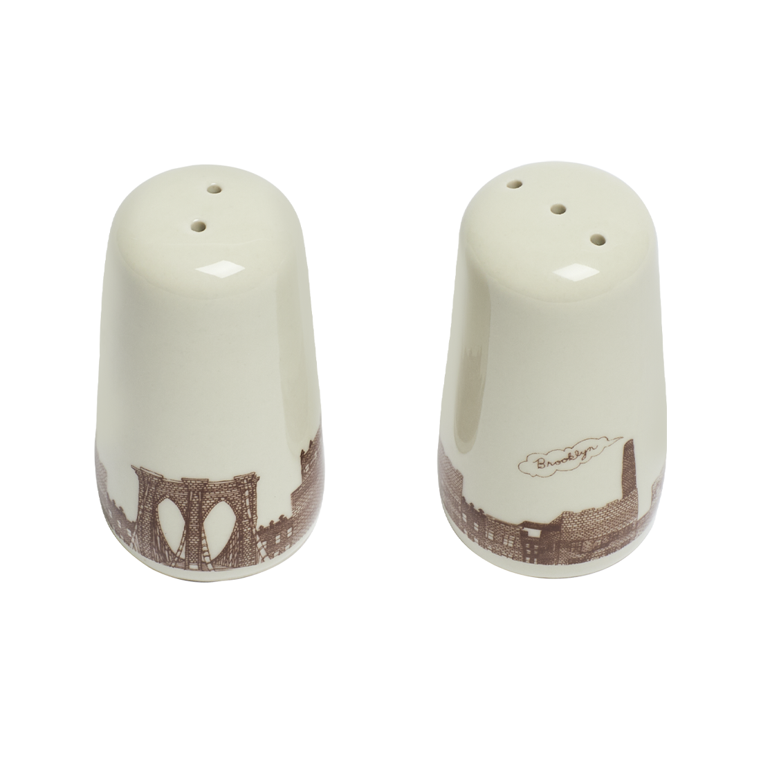 Two ceramic salt and pepper shakers with decorative designs on a white background