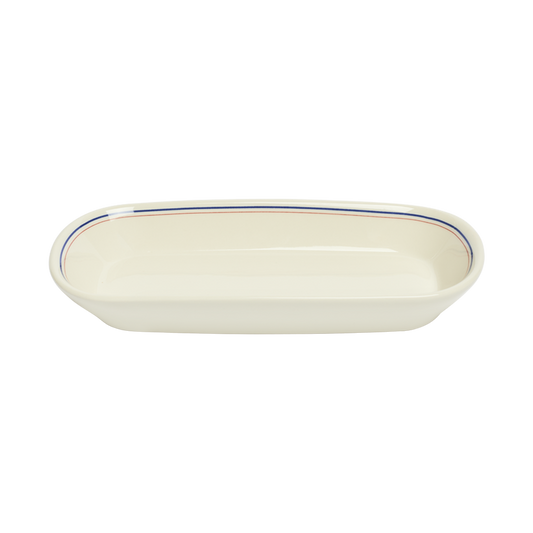 Rectangular ceramic dish with blue rim on a white background