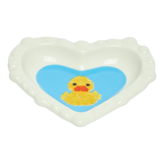 Heart-shaped object with a yellow rubber duck on a blue heart background