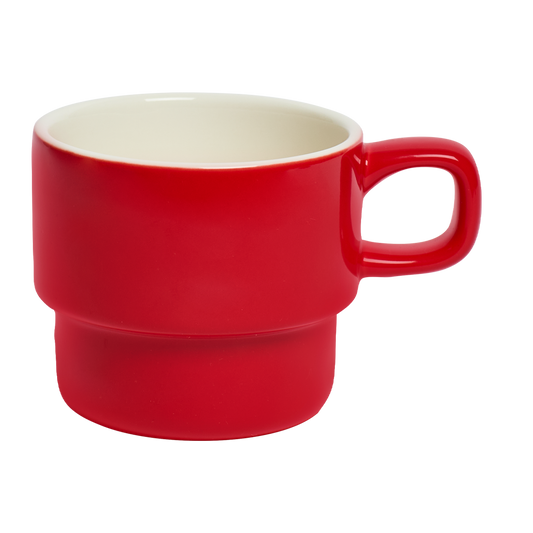 Red ceramic mug with a white interior on a white background