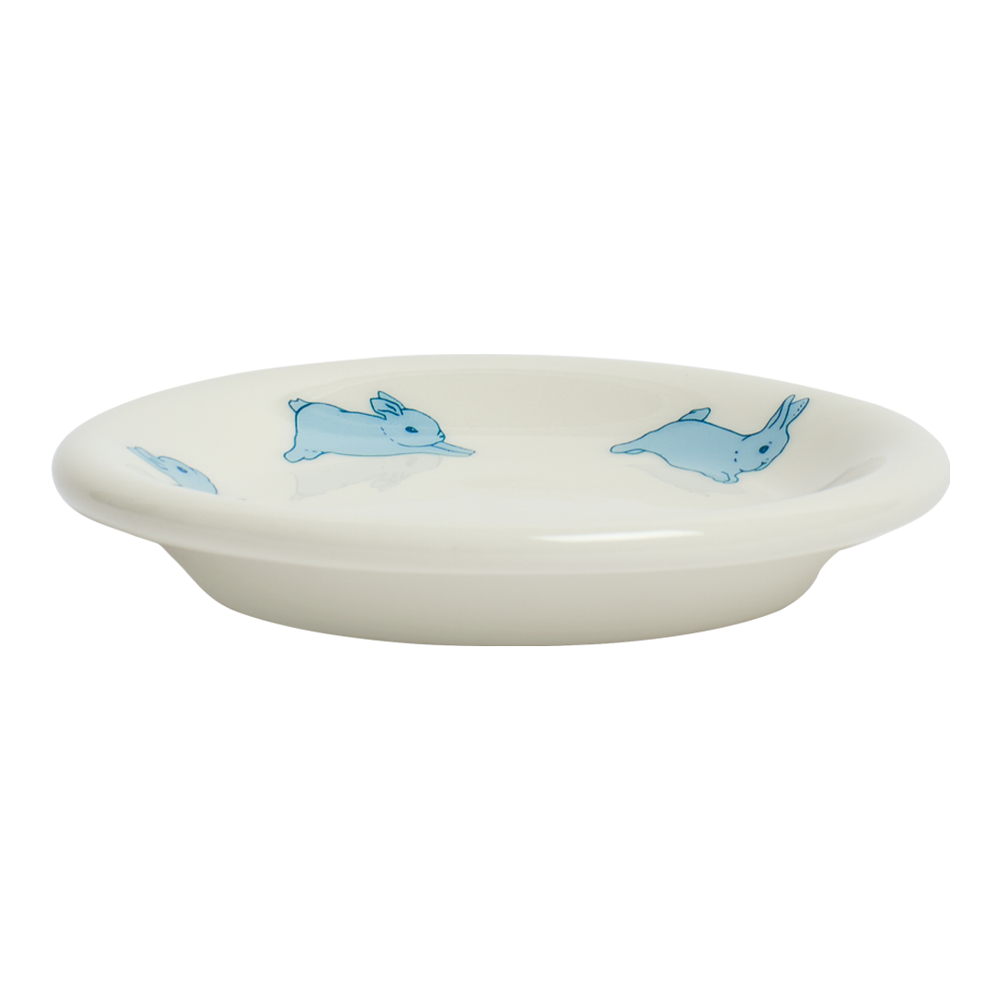 White ceramic dish with blue rabbit illustrations on a white background