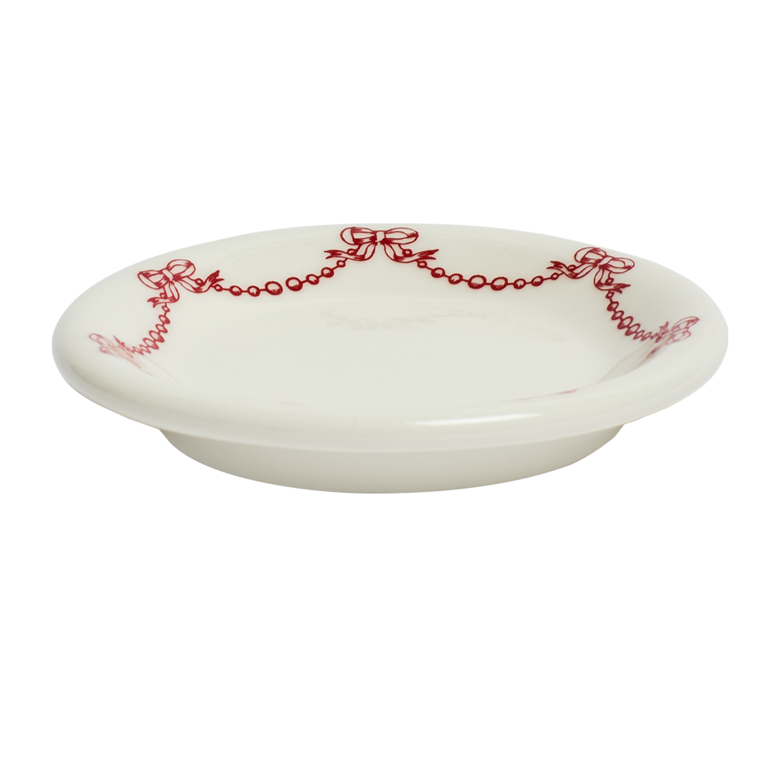 White ceramic plate with red decorative patterns on a white background