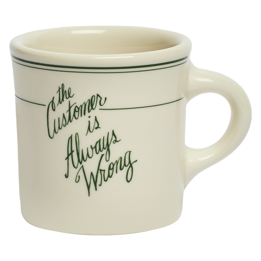 White mug with black text 'The Customer is Always Wrong' on a white background
