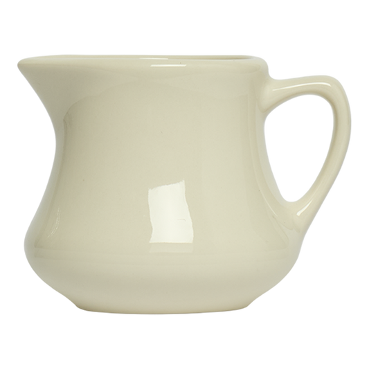 Cream-colored ceramic pitcher on a white background