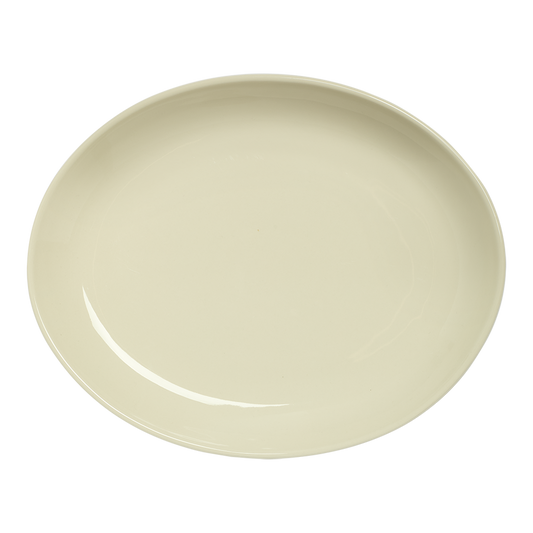 Beige ceramic plate on a white background