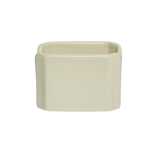 Beige ceramic planter on a white background