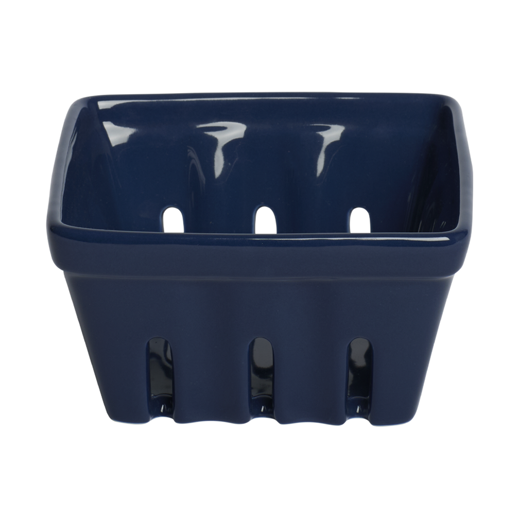Navy blue plastic berry basket on a white background