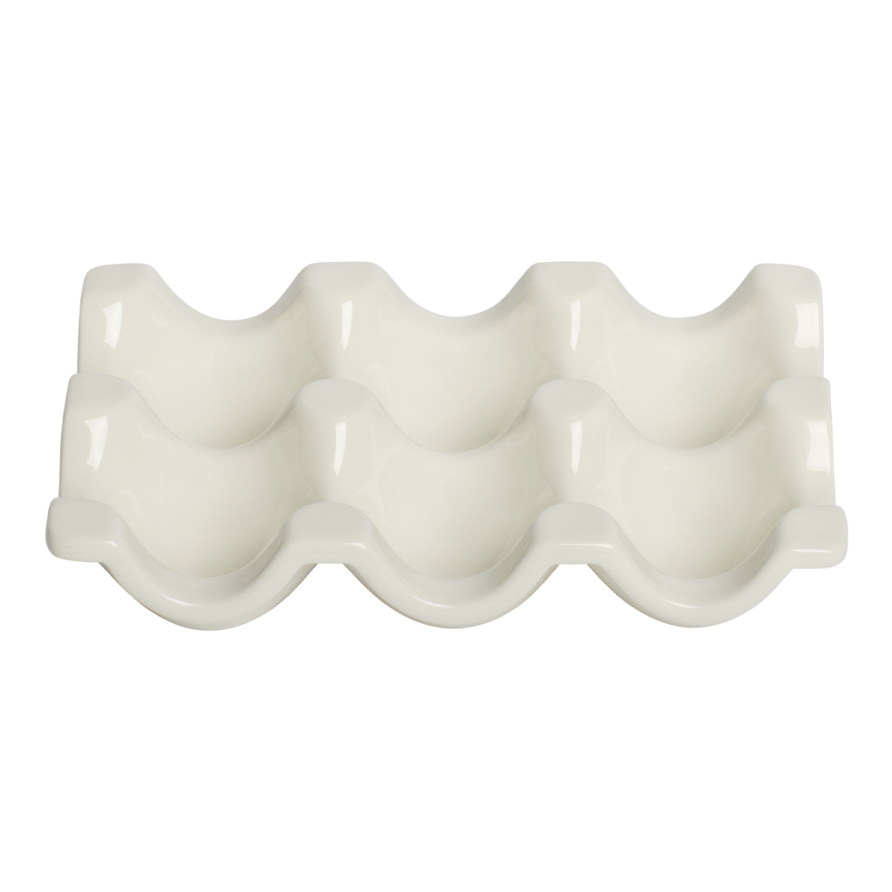White ceramic egg holder with wavy design on a white background