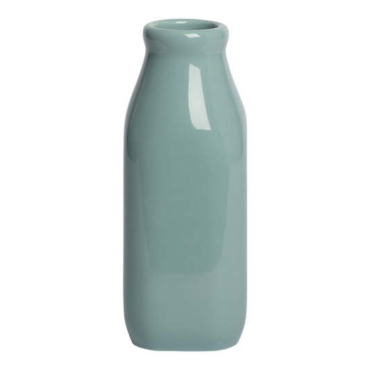 Green ceramic bottle-shaped vase on a white background