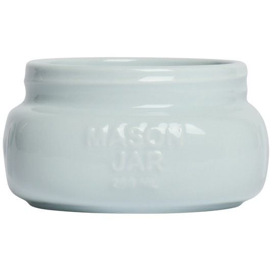 Light blue ceramic pot on a white background