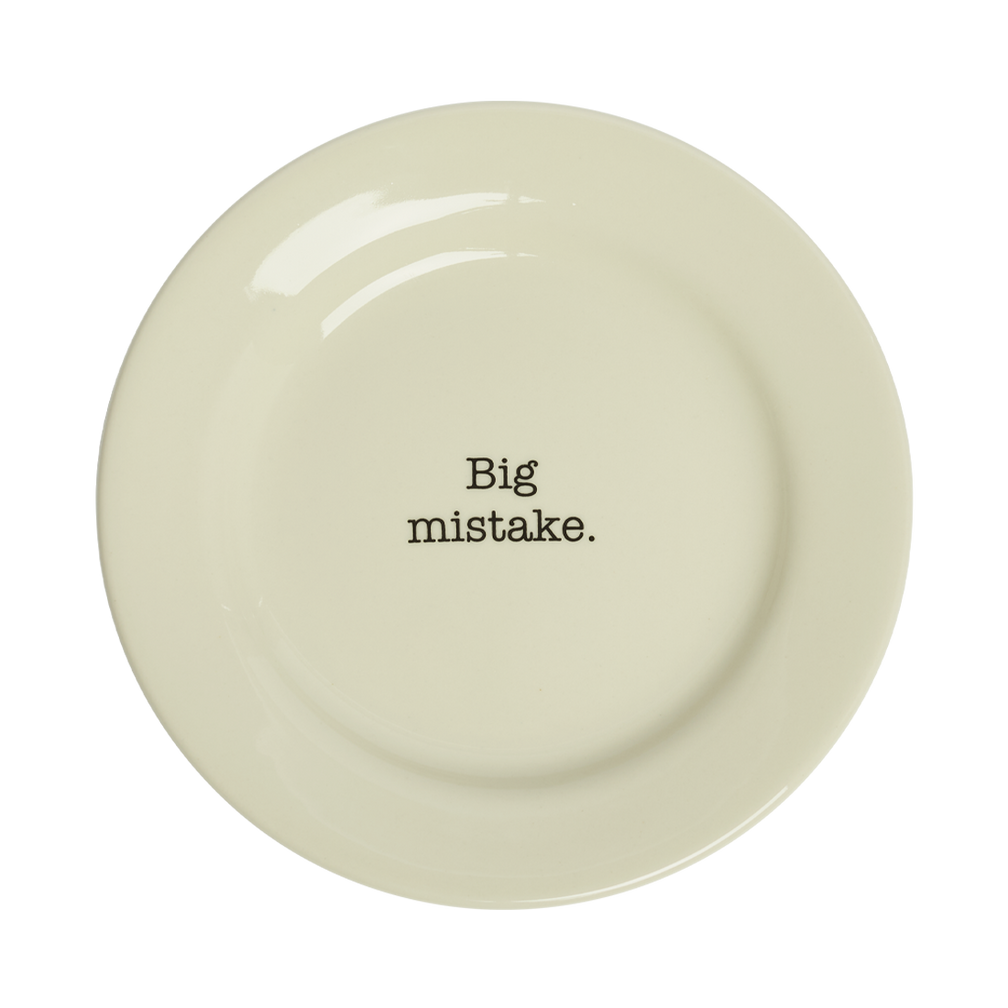 Beige plate with 'Big mistake.' text on a white background