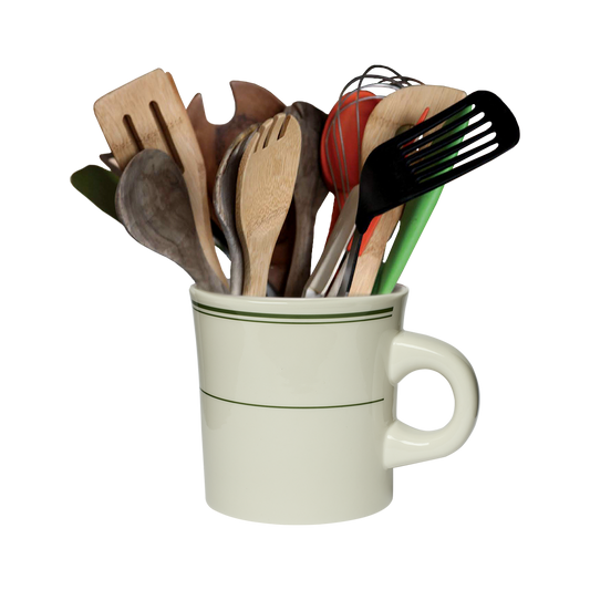 A white ceramic crock with a green stripe on the top, filled with various kitchen utensils.