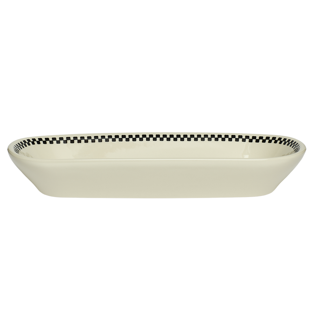 White ceramic serving bowl with black checkered rim on a white background