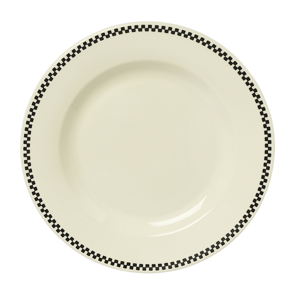 A white plate with a black checkerboard pattern around the edge.