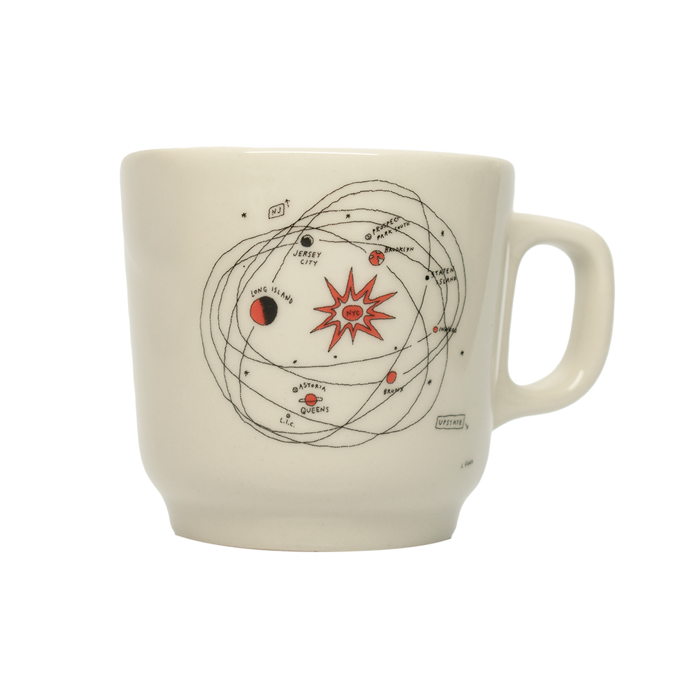 A white ceramic mug with a hand-drawn illustration of a solar system with planets and a central star.