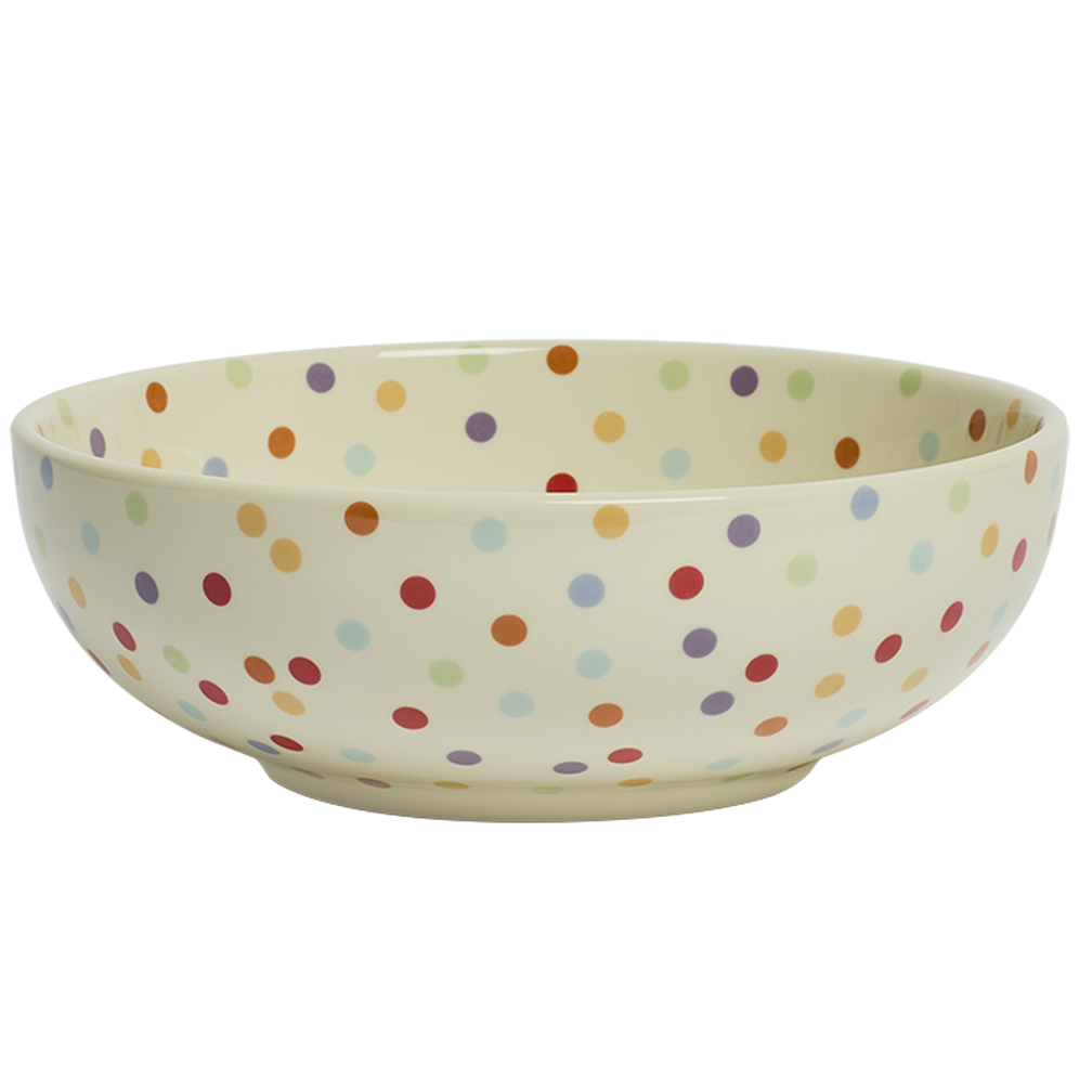 Ceramic bowl with multicolored polka dot pattern on a white background