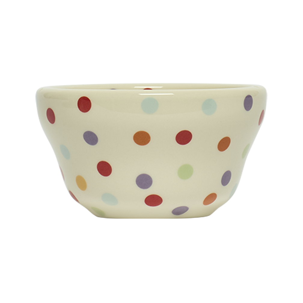 Ceramic bowl with multicolored polka dot pattern on a white background