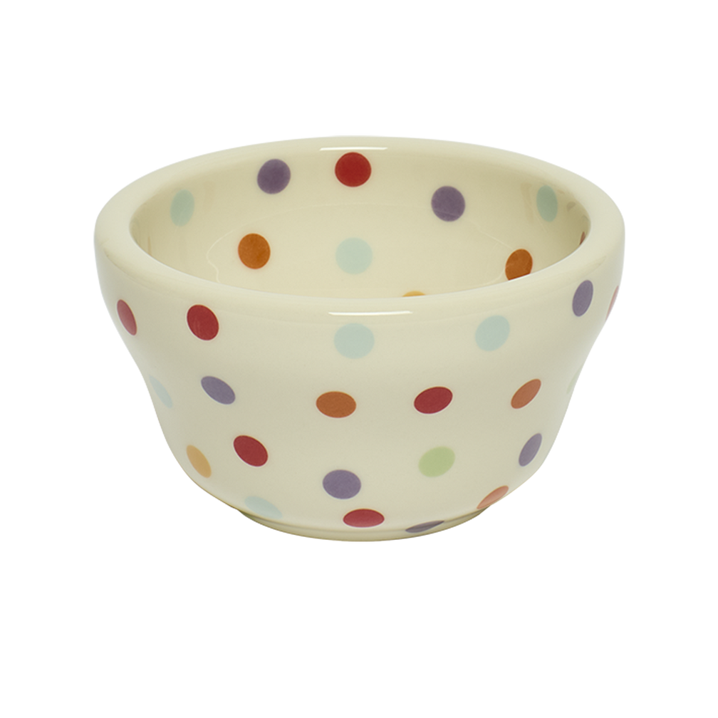 Ceramic bowl with colorful polka dot pattern on a white background