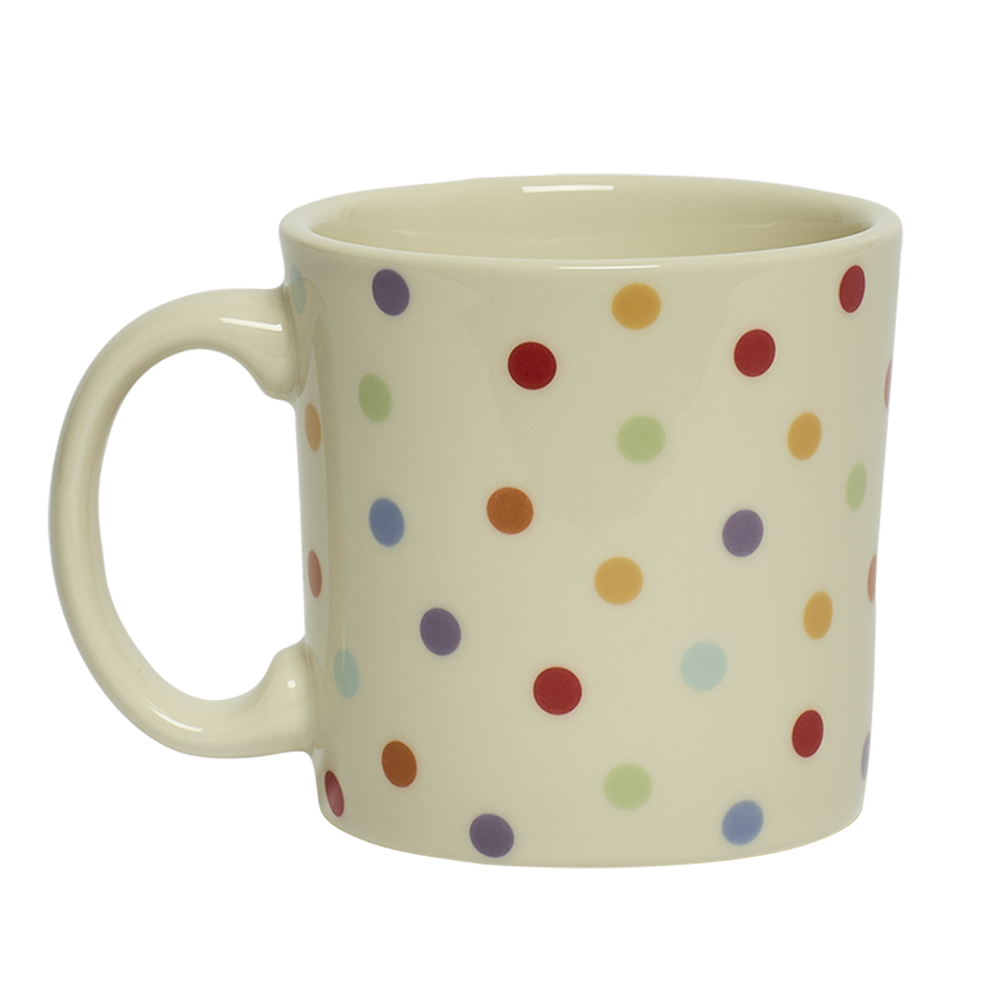 White mug with colorful polka dot pattern on a white background