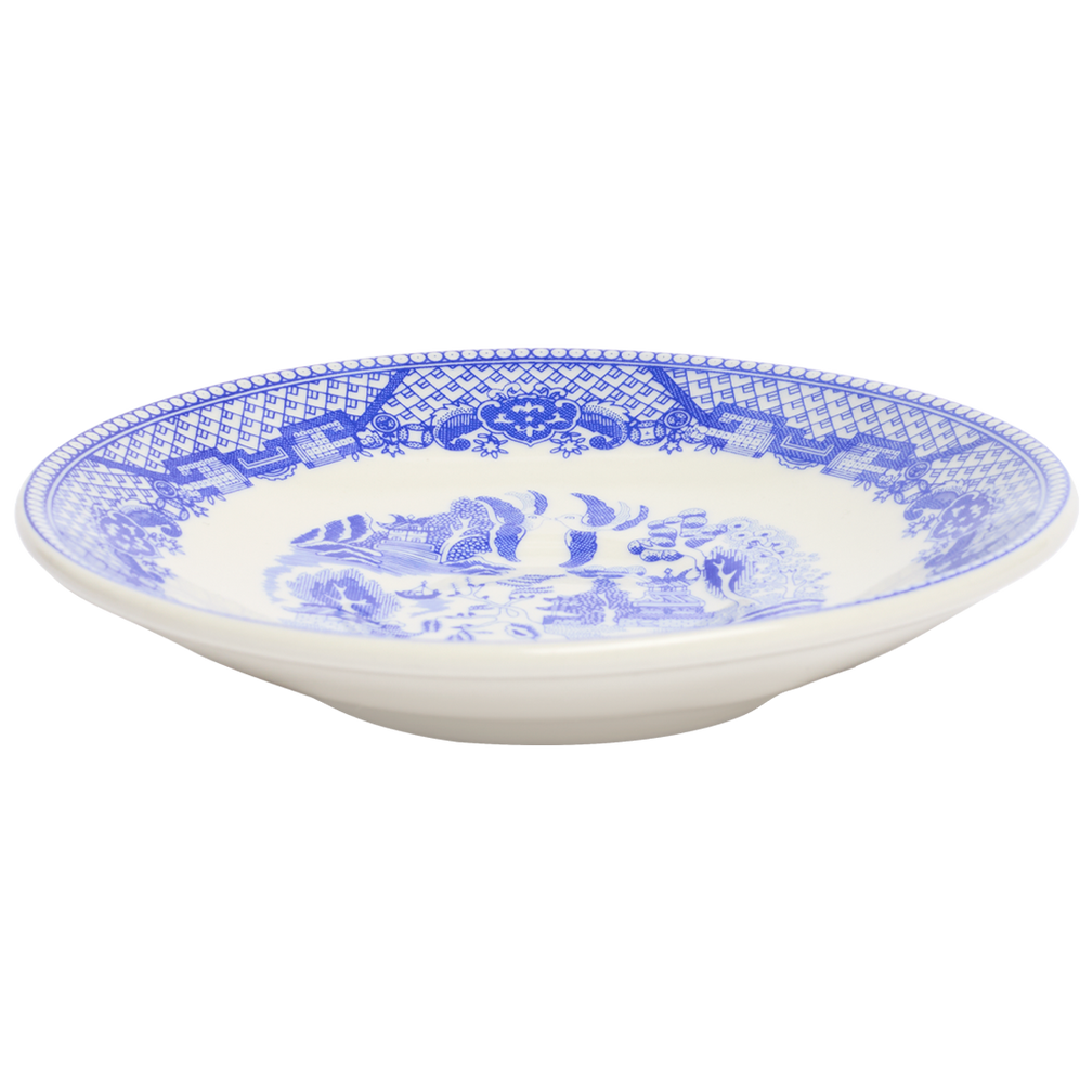 White ceramic plate with blue floral pattern on a white background