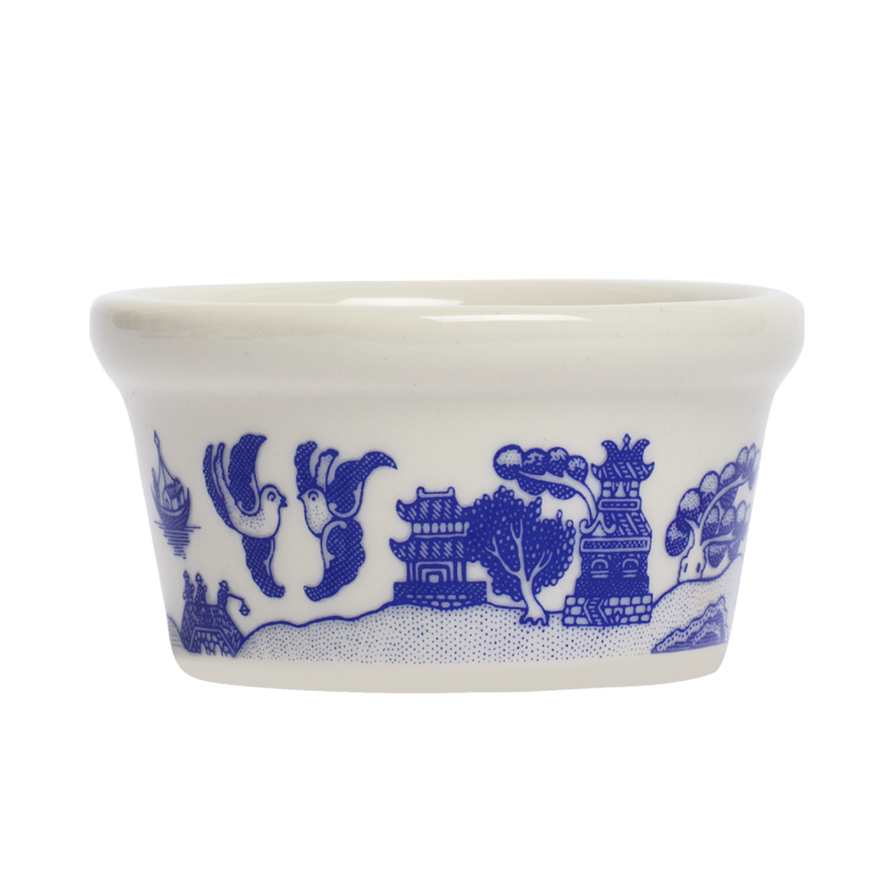 White bowl with blue decorative patterns on a white background