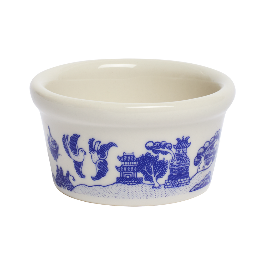 White ceramic bowl with blue decorative patterns on a white background