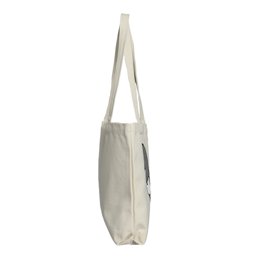 Beige tote bag with a small logo on a white background