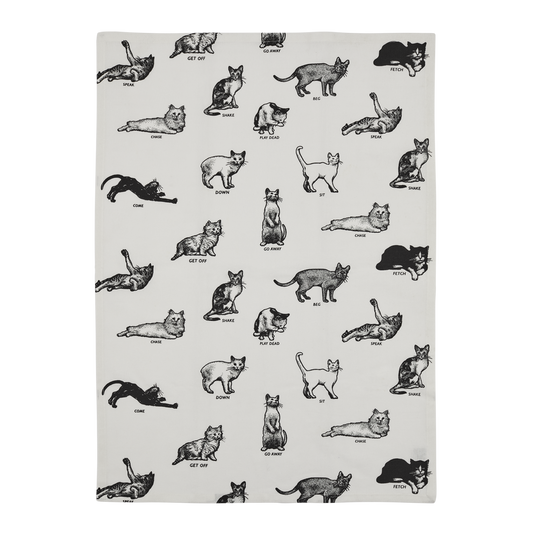 Tea towel with black and white illustrations of cats on a white background