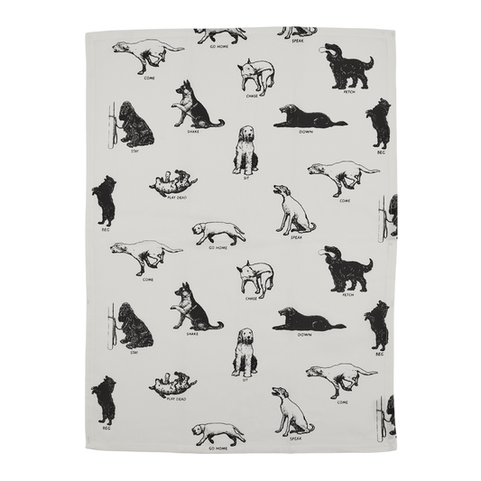 Tea towel with black and white illustrations of dogs on a white background