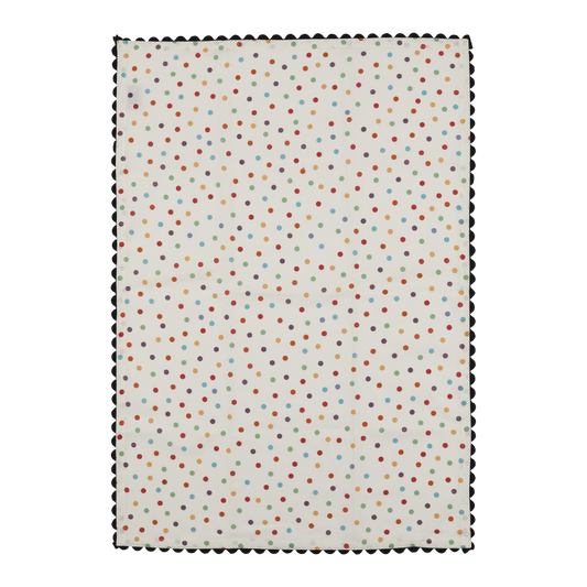 Polka dot patterned fabric swatch on a white background