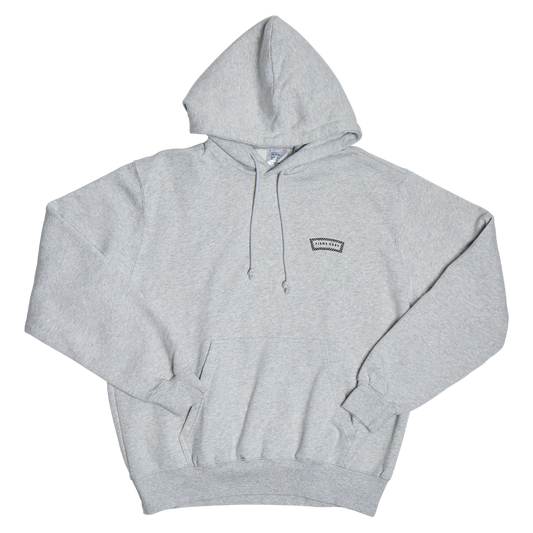 Gray hoodie with a small logo on a white background