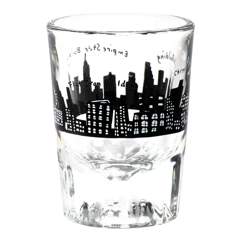 Clear glass tumbler with black city skyline design on a white background