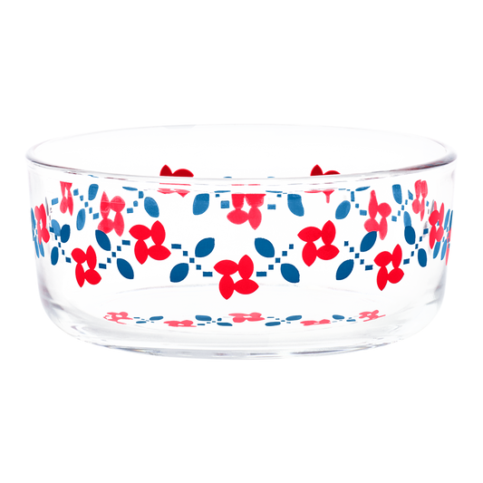 Glass bowl with floral pattern in red and blue on a white background