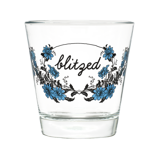 Clear glass with floral design and 'blitzed' text on a white background
