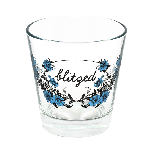 Clear glass with floral design and 'blitzed' text on a white background