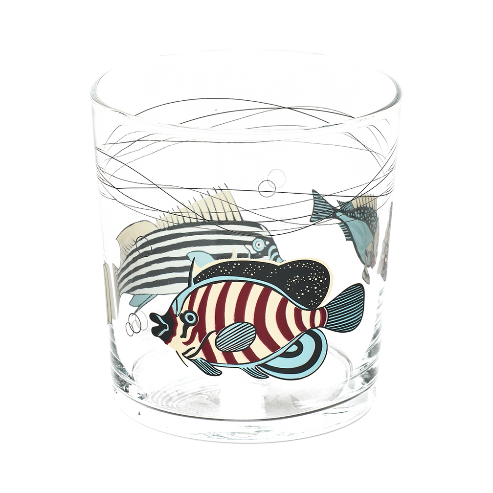 Clear glass tumbler with colorful fish illustrations on a white background
