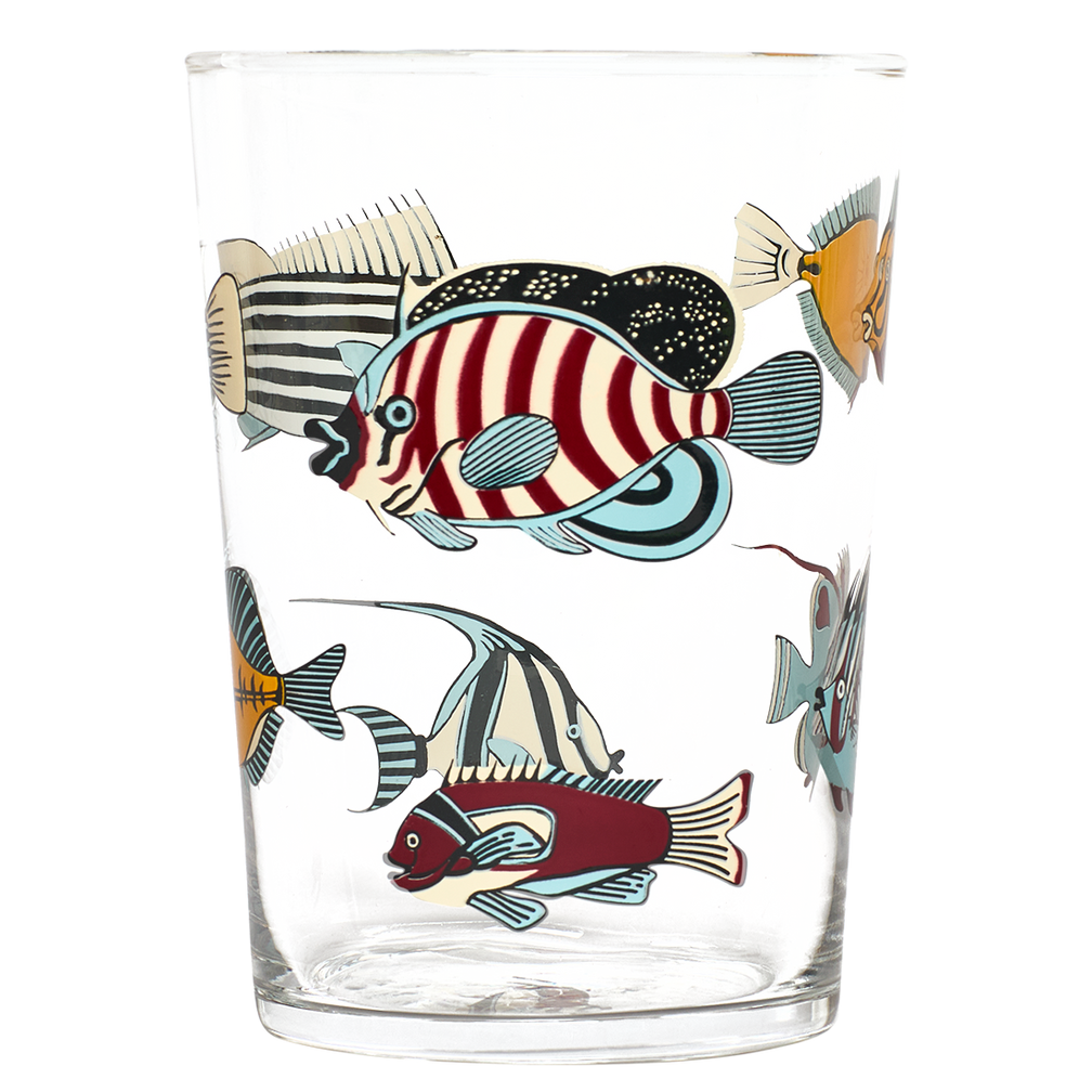 Clear glass tumbler with colorful fish illustrations on a white background