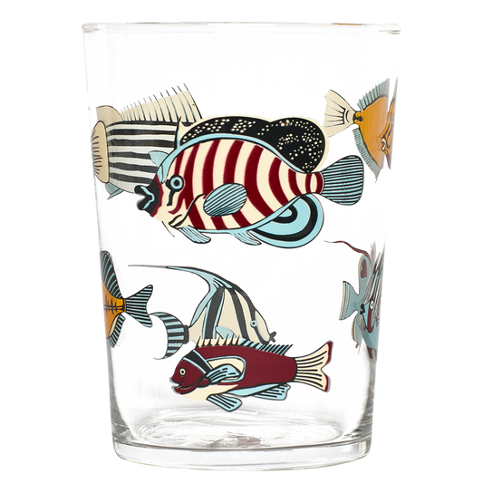 Clear glass tumbler with colorful fish illustrations on a white background