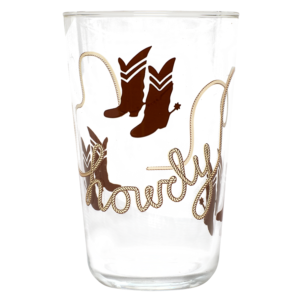 Clear glass tumbler with cowboy boot and lasso design on a white background