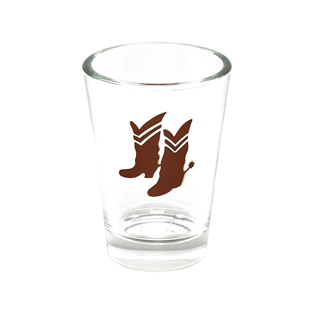 Clear glass shot glass with brown cowboy boot design on a white background