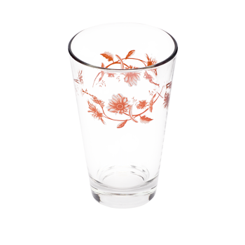 Angled top view of orange floral glass showing the wraparound flower and vine design.